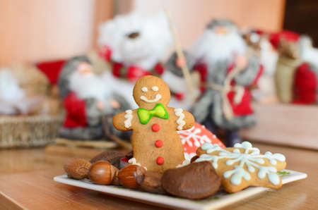 Smiling gingerbread man and christmas  cookies for christmasの写真素材