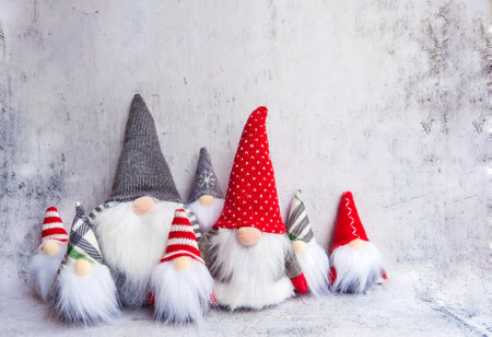 Christmas gnomes on a gray background. Christmas card. Copy space.の写真素材