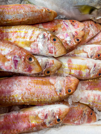 Fresh fish on ice at the market. Selective focus. Shallow depth of field