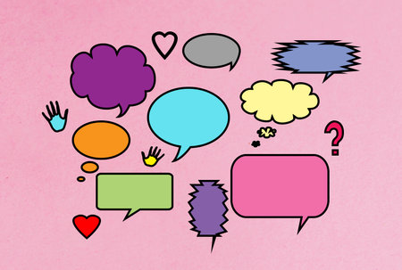 Comic speech bubbles on pink paper background. Pop art retro style.の写真素材