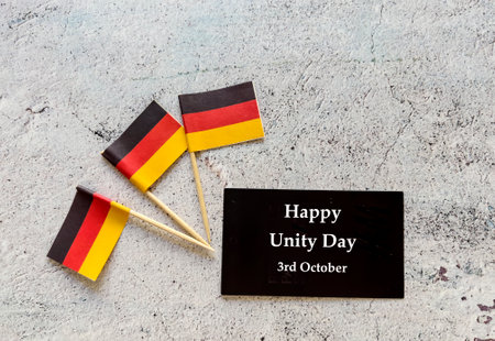 German flag on a stone background with german textの写真素材