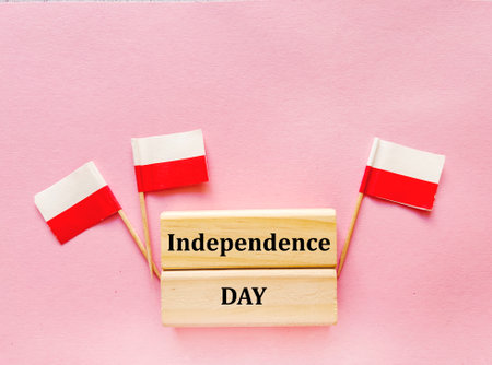 Independence day concept. Flags of Poland and Austria on a pink backgroundの写真素材