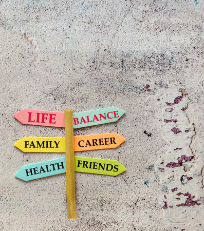 Colorful signpost on concrete wall.の写真素材