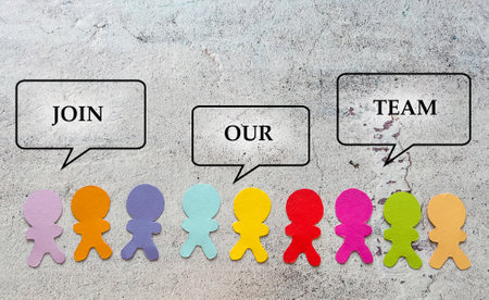 Colorful paper people with speech bubbles on concrete background. Concept of teamwork