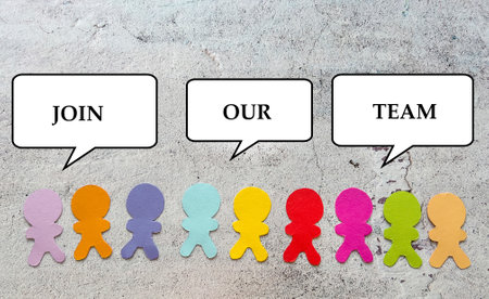 Colorful paper people with speech bubbles on concrete backgroundの写真素材