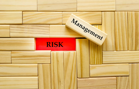 Wooden blocks with the word Risk Management. Business conceptual image.の写真素材