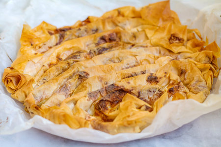 Baklava in a white paper bagの写真素材