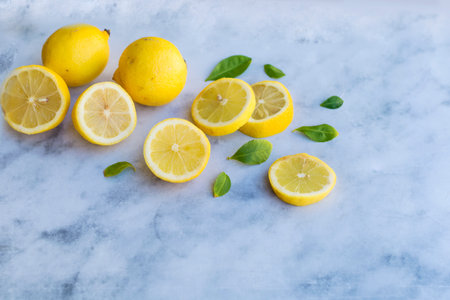 Lemons and lemonsle background. Top view.の写真素材