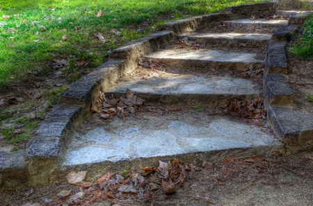 HDR image of curved stone stairs in park gardenの写真素材