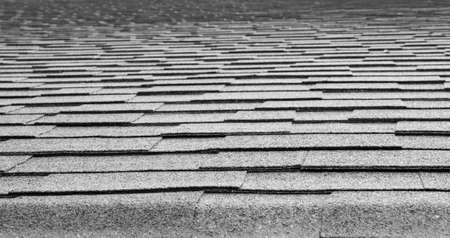 Black and white image of a composition roof diminishing to soft focus at the top of the imageの写真素材