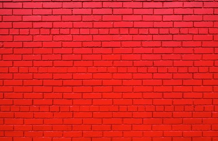 Large brick wall that has been painted lipstick redの写真素材