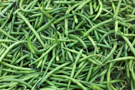 Big pile of green string beans at the farmers marketの写真素材