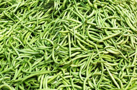Big pile of Green string Beans at the farmers marketの写真素材