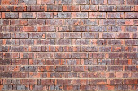 Manufactured red Faux used brick wall