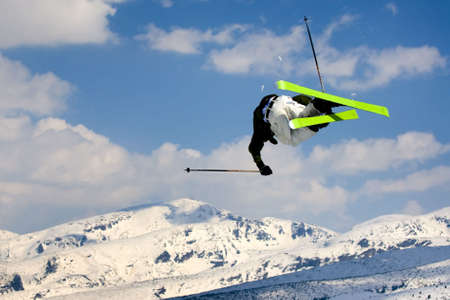 Extreme skier jumping  over the  snow -mountain.の写真素材