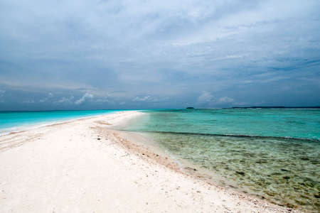 Maldives beach view with clear blue water and white sand .の写真素材