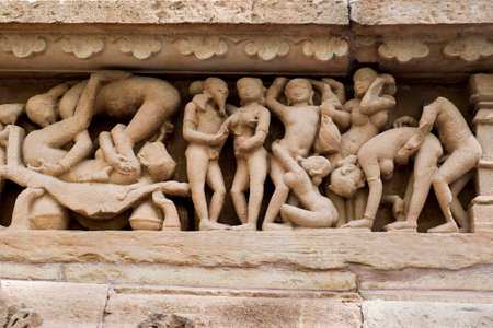 Stone carved erotic sculptures in Hindu temple in Khajuraho Madhya Pradesh India
