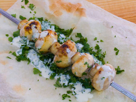 Grilled mushrooms on skewerの写真素材
