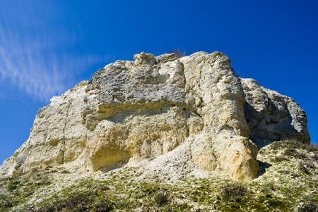 Bright rocks on the background of blue skyの写真素材