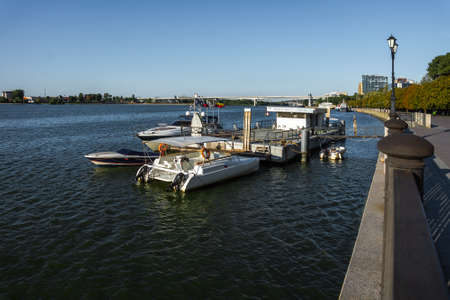 ROSTOV-ON-DON, RUSSIA - SEPTEMBER 7, 2021: Don river and floating pier with moored boatsのeditorial素材