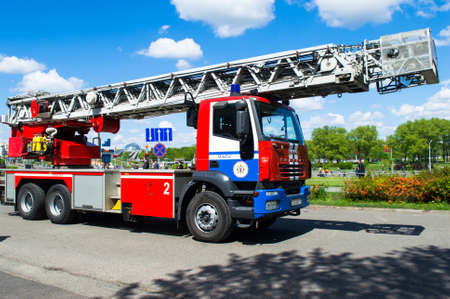 Fire truck Iveco Magirus red white blue color on street of Minsk Belarusのeditorial素材