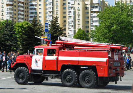 Fire truck zil red white blue color on street of Minsk Belarusのeditorial素材
