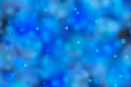Bright blue magic light in the dark, abstract background.のイラスト素材
