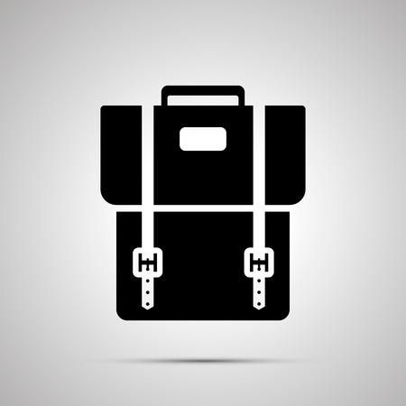 School backpack silhouette, simple black icon with shadow.のイラスト素材