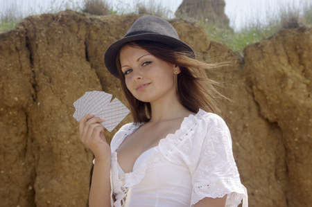 Country-gril with cards in a hatのeditorial素材