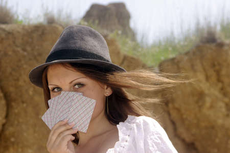 Country-gril with cards in a hatのeditorial素材