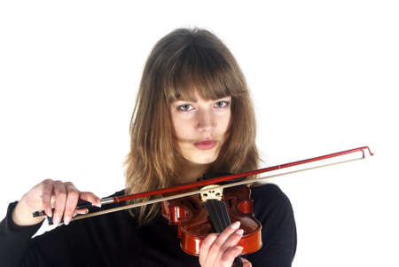 beautiful girl  with violin. serious face over whiteの写真素材