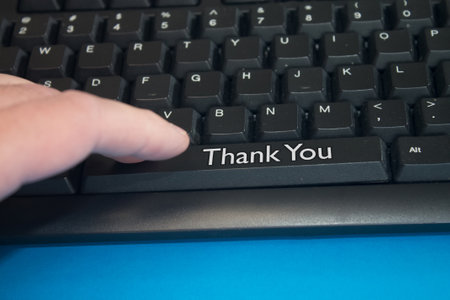Black Computer Keyboard with Thank You text. Close-up of an electronic Computer Device part, keypad.の写真素材