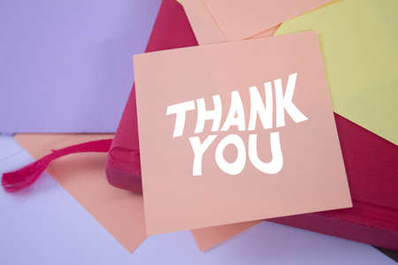 Thank You. Text on adhesive note paper. Event, celebration reminder message.の写真素材