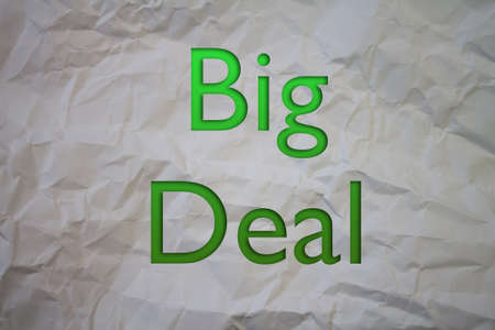 Big Deal text with Torn, Crumpled White Paper on colored background.の写真素材