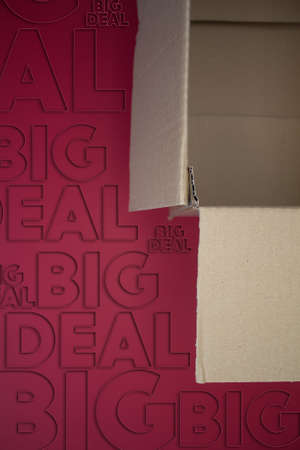Big Deal word with cardboard box. Brown folded cardbox.の写真素材