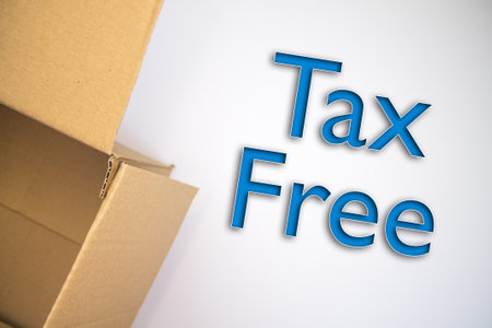 Tax Free word with cardboard box. Brown folded card box.の写真素材