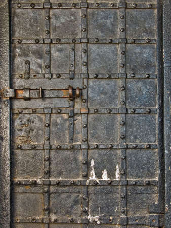 Forged door Demidov inclined tower in the city Nevyanskaの写真素材
