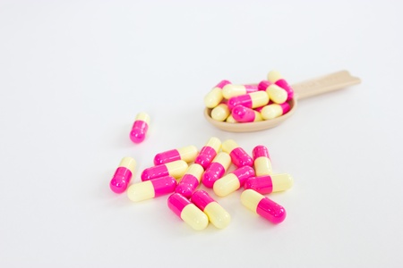 Pink, yellow capsulesの写真素材