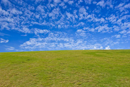 green hills and blue skyの写真素材
