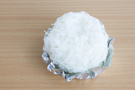 Coconut cake on brown woodの写真素材