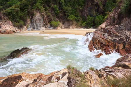 Rocky beach with sea water erosionの写真素材