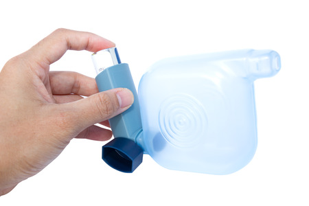 Asthma inhaler isolated on white backgroundの写真素材