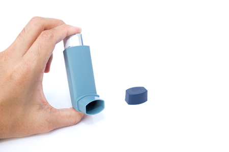 Asthma inhaler isolated on white backgroundの写真素材