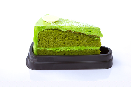 Green tea cake isolated on white backgroundの写真素材