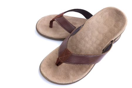Leather sandals isolated on white backgroundの写真素材