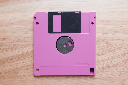 Floppy disk on woodの写真素材