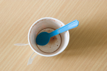 Paper coffee cup on wood tableの写真素材
