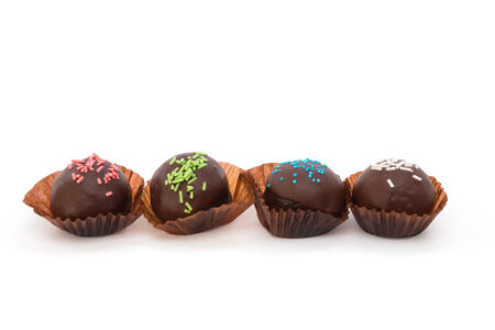 Chocolate balls isolated on white backgroundの写真素材