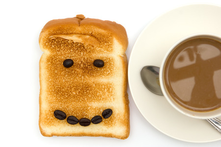 Coffee and toast isolated on white backgroundの写真素材