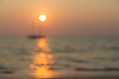 Blur tropical sunset beach backgroundの写真素材